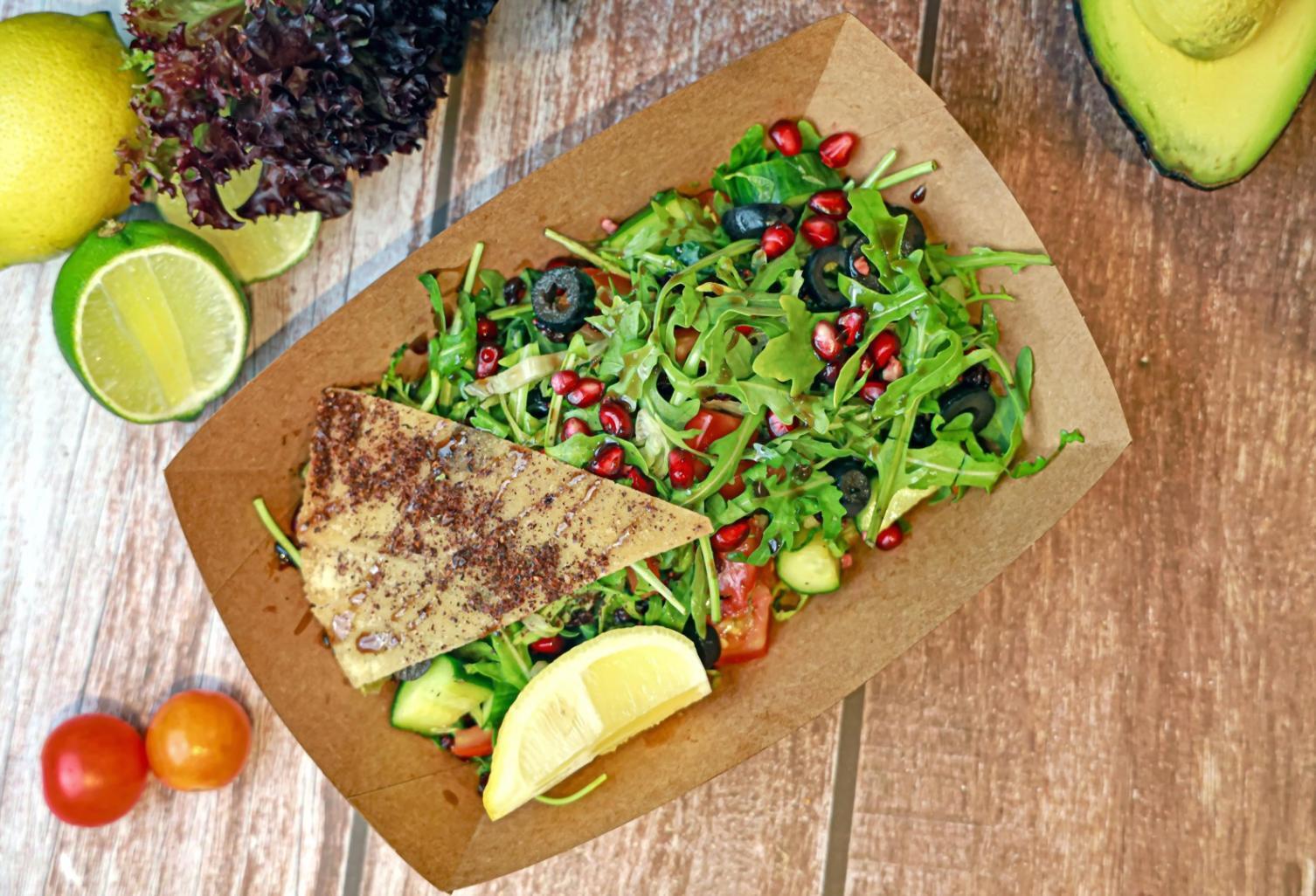 Professional food plating demonstration showing techniques taught in our online sessions